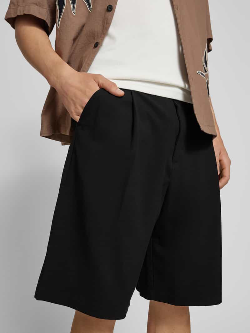 REVIEW Korte tailored fit broek met bandplooien