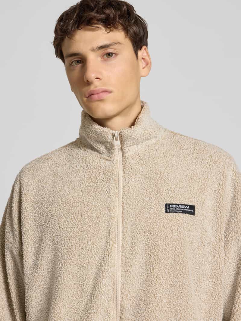 REVIEW Fleecejack met opstaande kraag en labeldetail
