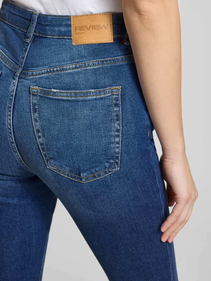 Review Essentials skinny jeans