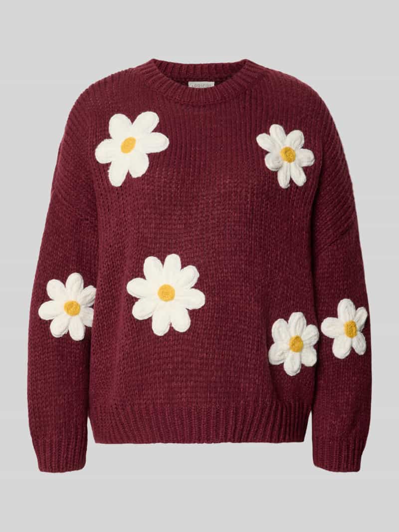 Apricot oversized gebreide pullover met florale stitchings