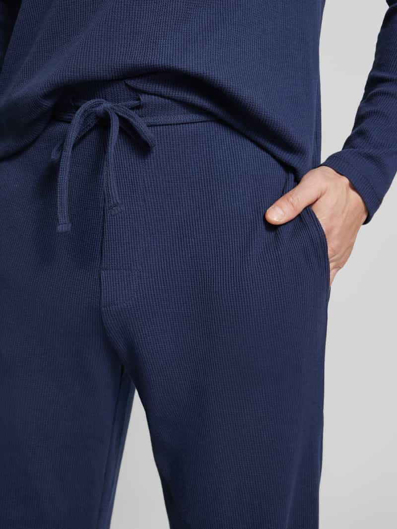 Christian Berg Men Loose fit sweatpants met steekzakken opzij