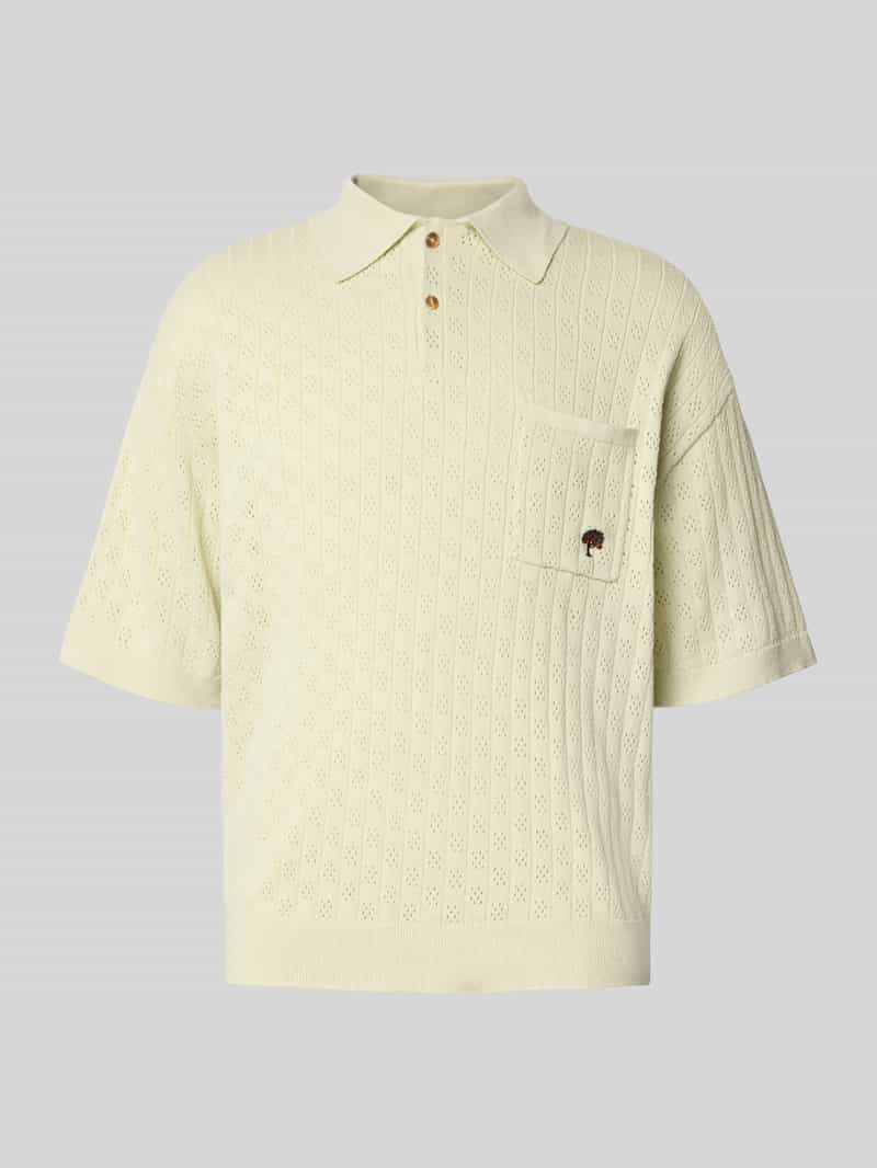 Relaxed fit poloshirt met pointellemotief