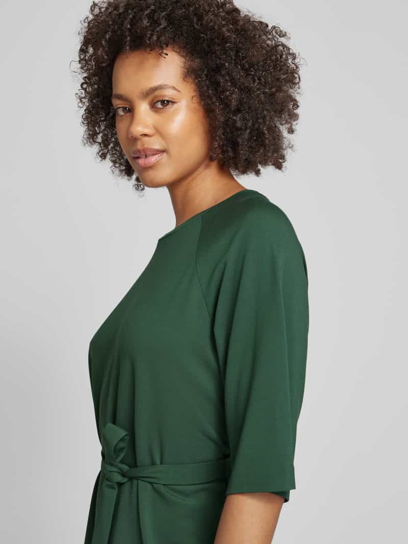 b.Young Knielange jurk met strikceintuur model 'Tito'
