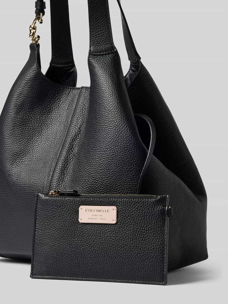 Coccinelle Handtas van leer met labelapplicatie
