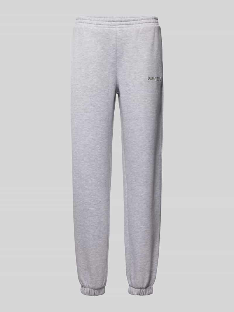 Review Loose fit sweatpants met labelprint