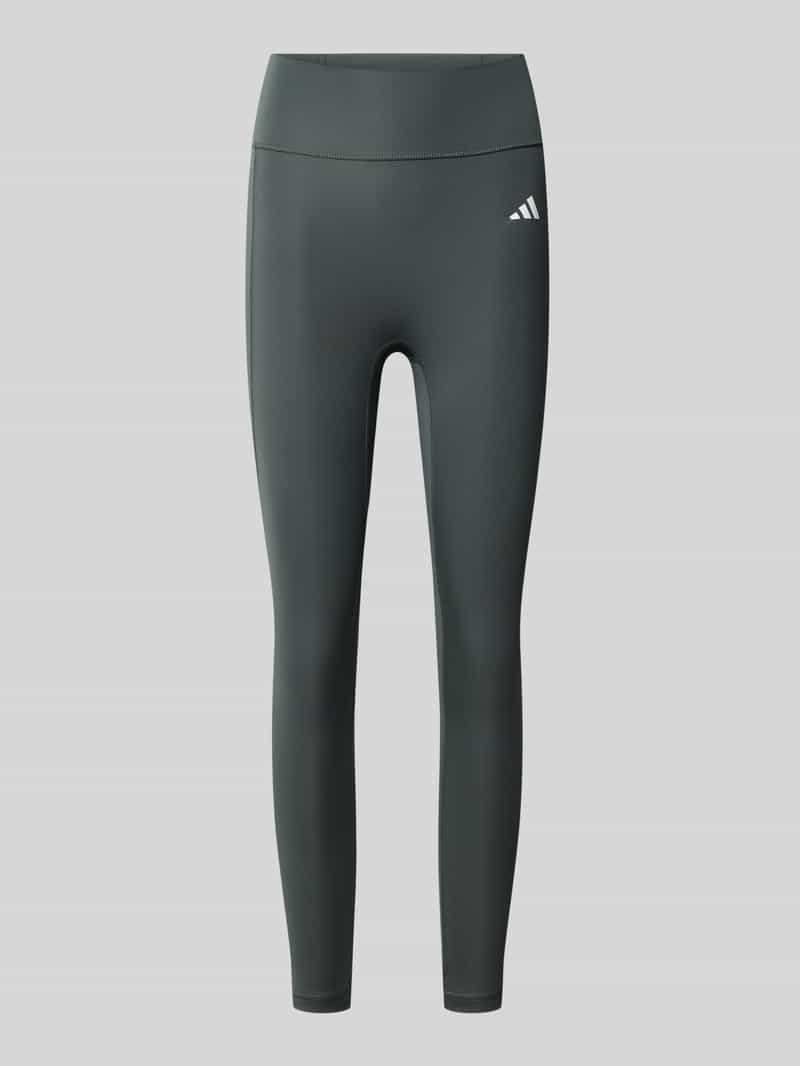 Nauwsluitende sport-legging met achterzak