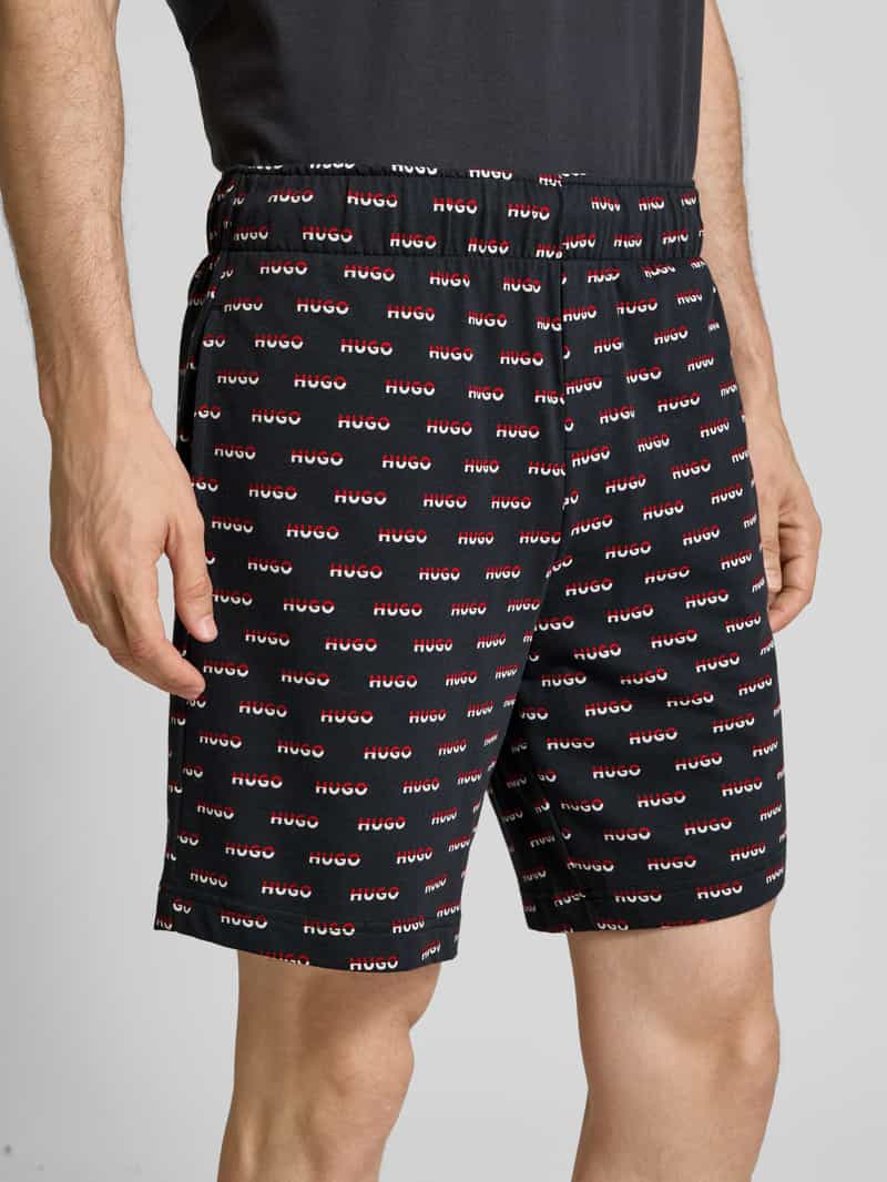 HUGO Korte broek van puur katoen met all-over logoprint