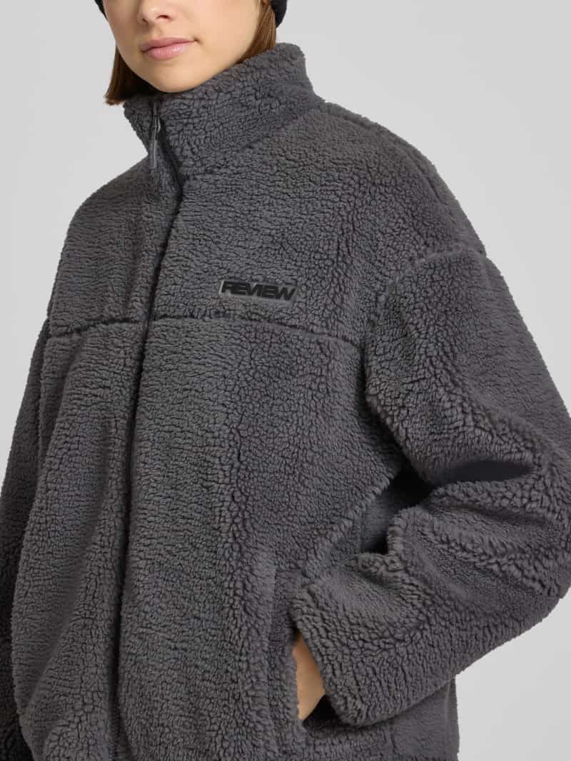 Review Fleecejack met opstaande kraag en labeldetail