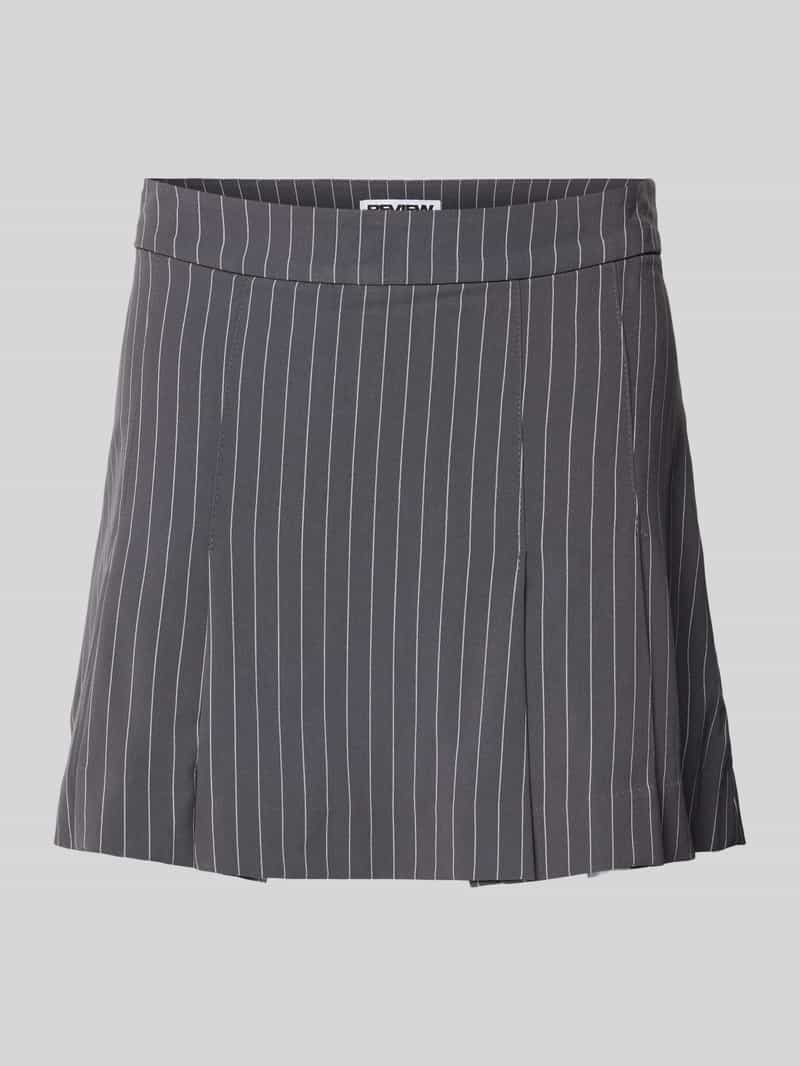 Review Minirok met plooien