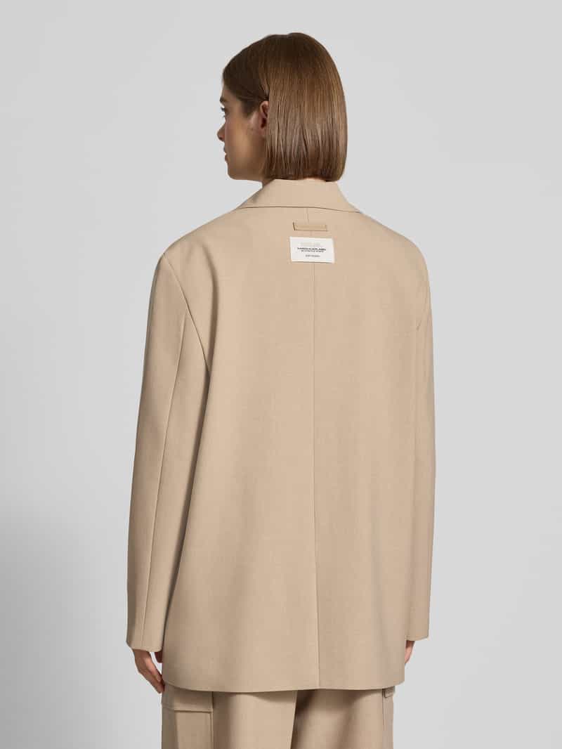 Karo Kauer Oversized lange blazer met labelpatch rug