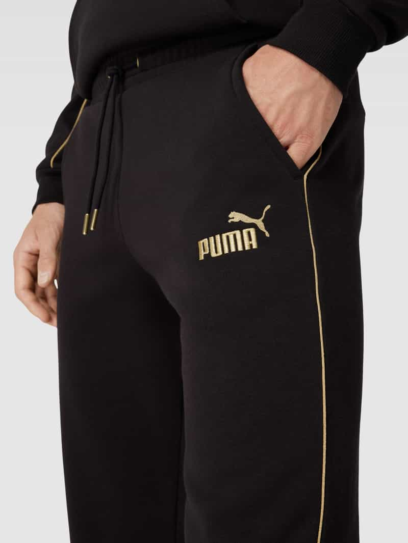 PUMA PERFORMANCE Sweatpants met labelstitching