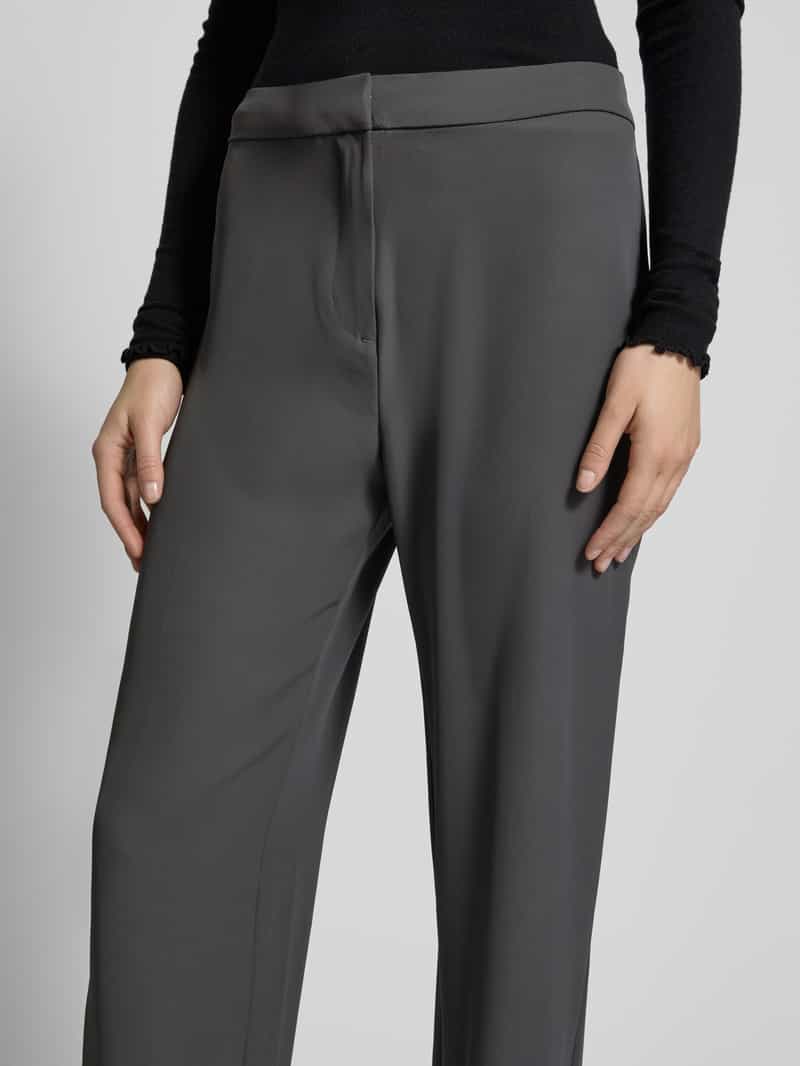 Review High waist stoffen broek met knoop haakjes- en ritssluiting