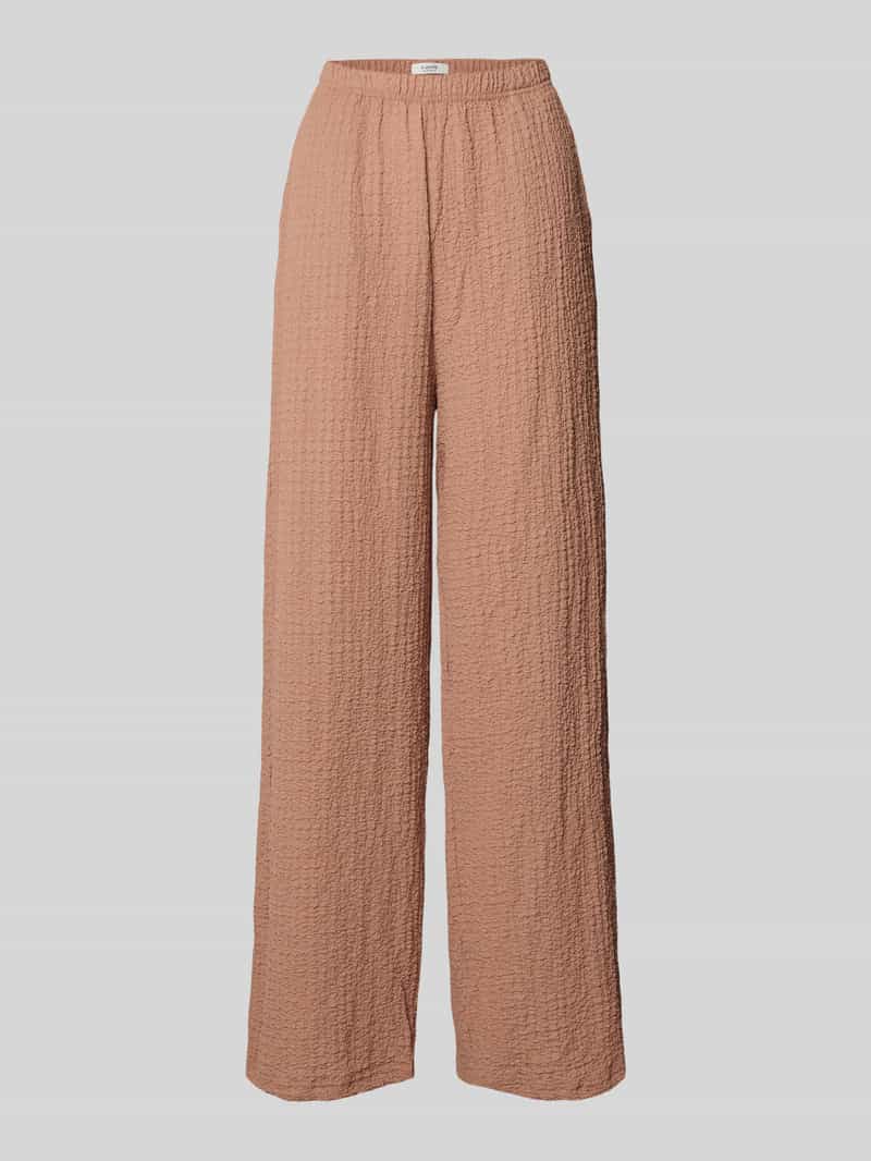 Broek met paspelzakken, model 'UMMI'