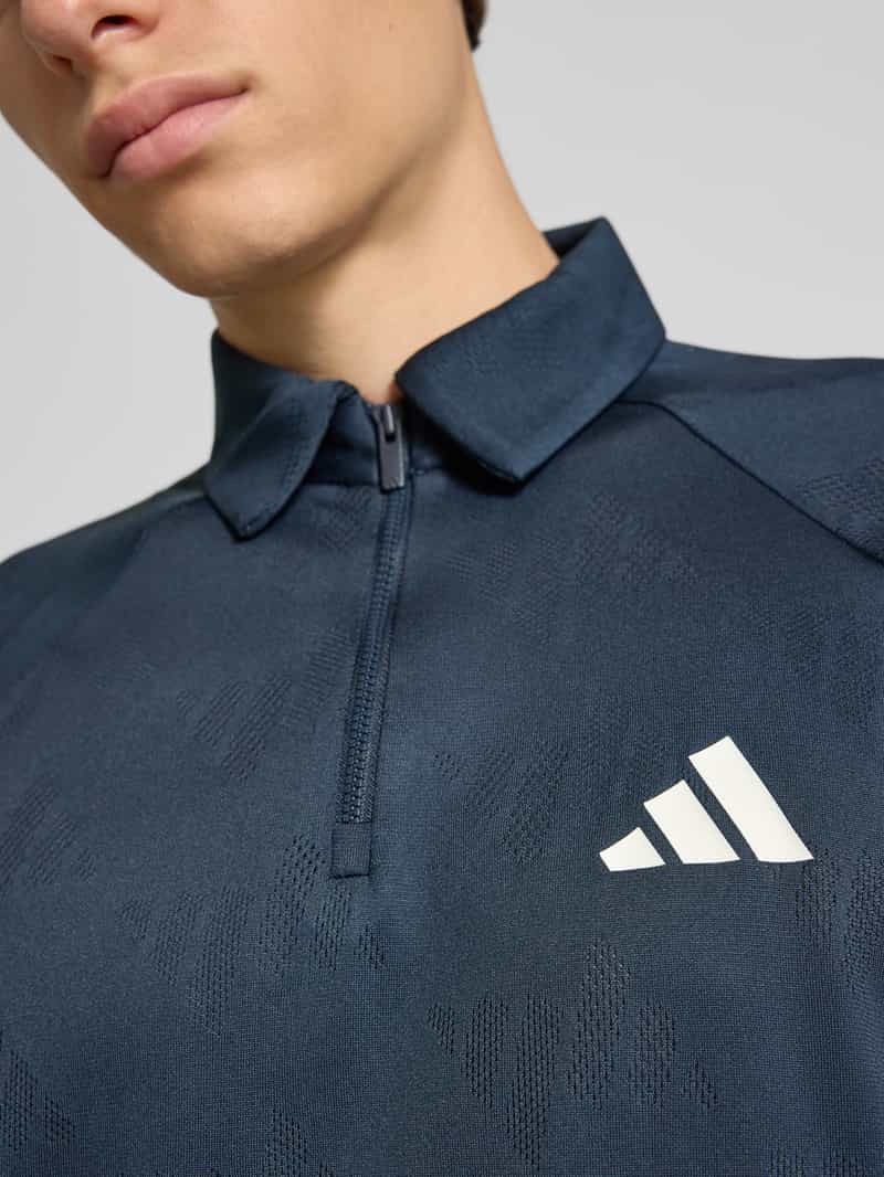 adidas Sportswear Regular fit poloshirt met logo en ritssluiting