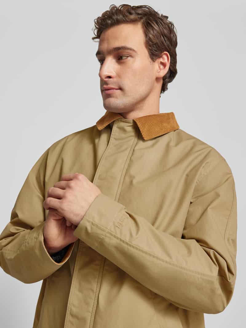 Forét Jas met strookzakken model 'ROW OILSKINJACKET'