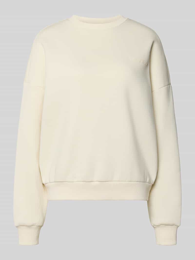 Basic sweater met ronde hals en boordjes aan de mouwen
