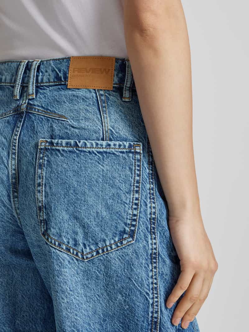 Review Barrel fit jeans met steekzakken