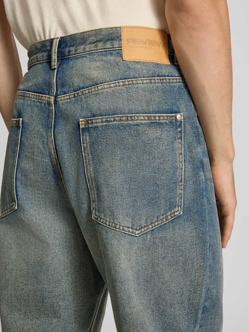 REVIEW Loose fit jeans met 5-pocketmodel
