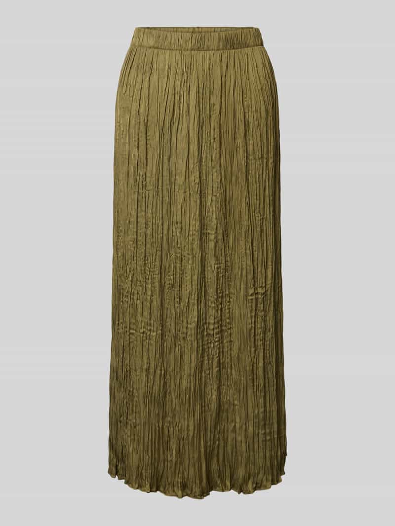 Oui Midirok in geplooide look