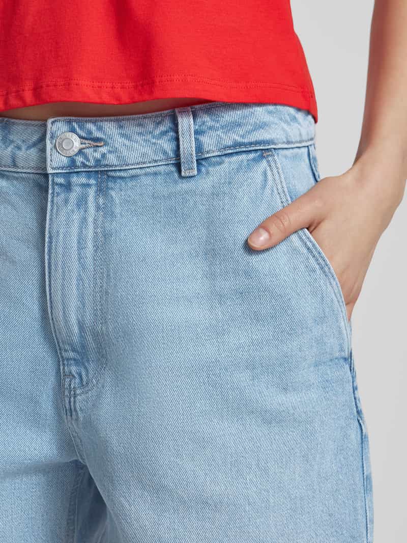 Review Korte jeans met stitchings en steekzakken
