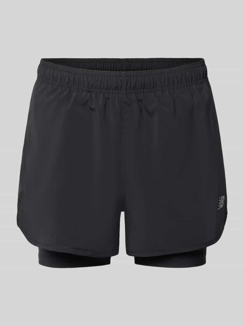 Short in 2-in-1-look met logo