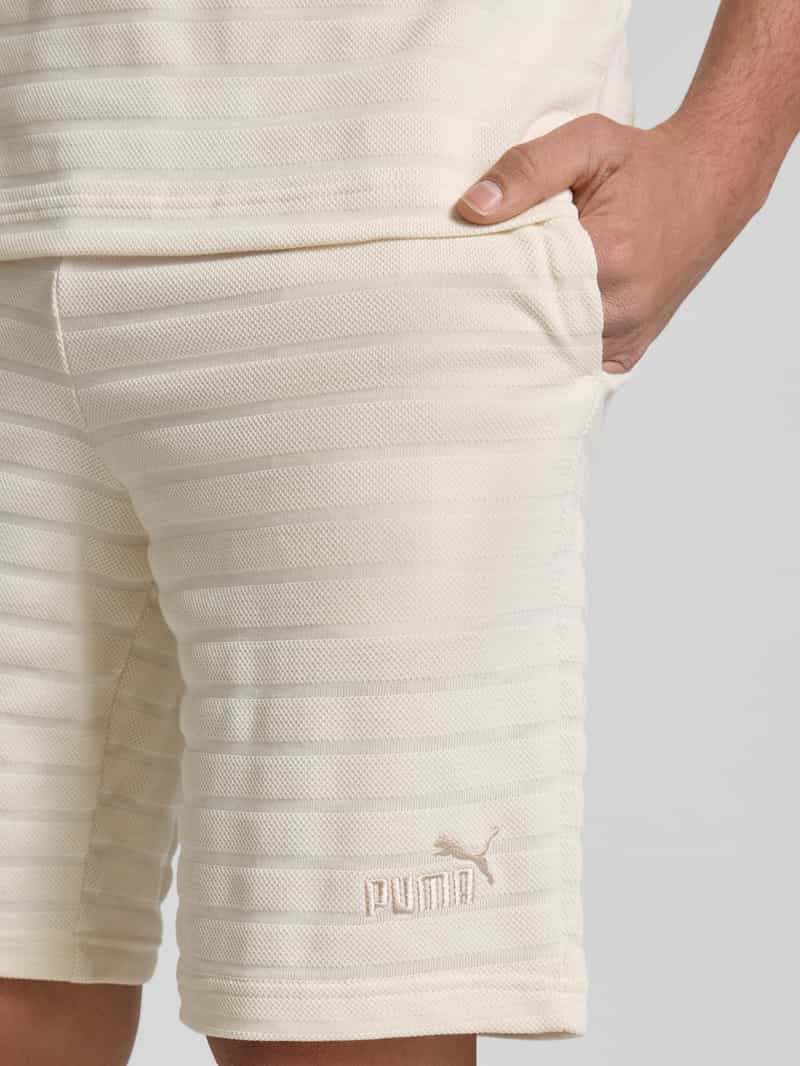 PUMA PERFORMANCE Slim fit korte broek met structuurmotief model 'ESS ELEVATED'
