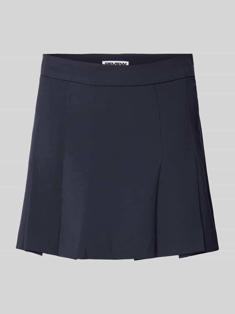 Review Minirok met plooien