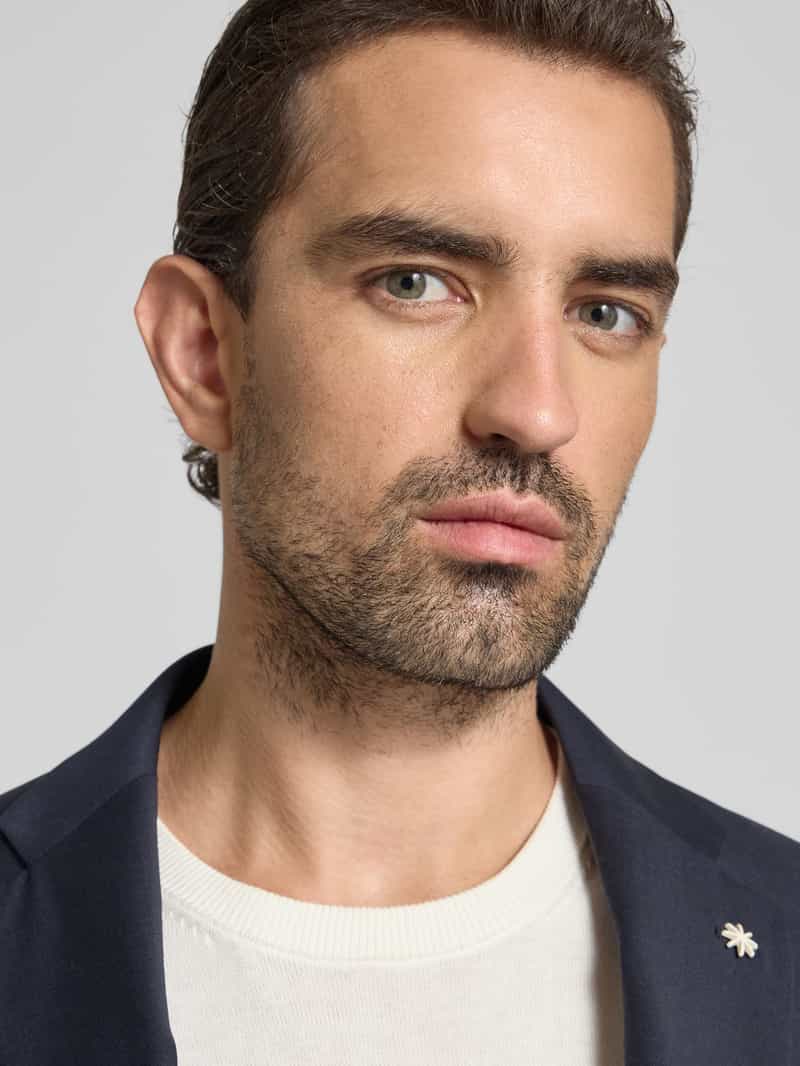Manuel Ritz Pak met reverskraag