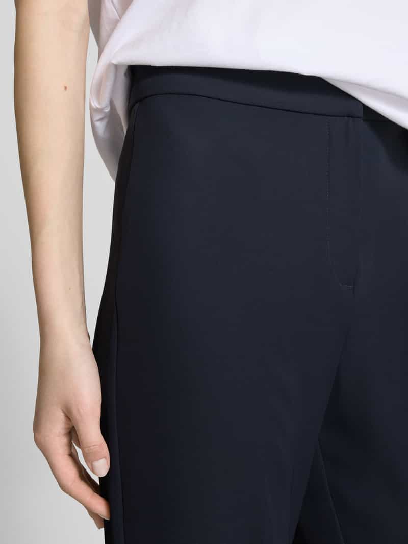 Review High waist stoffen broek met persplooien