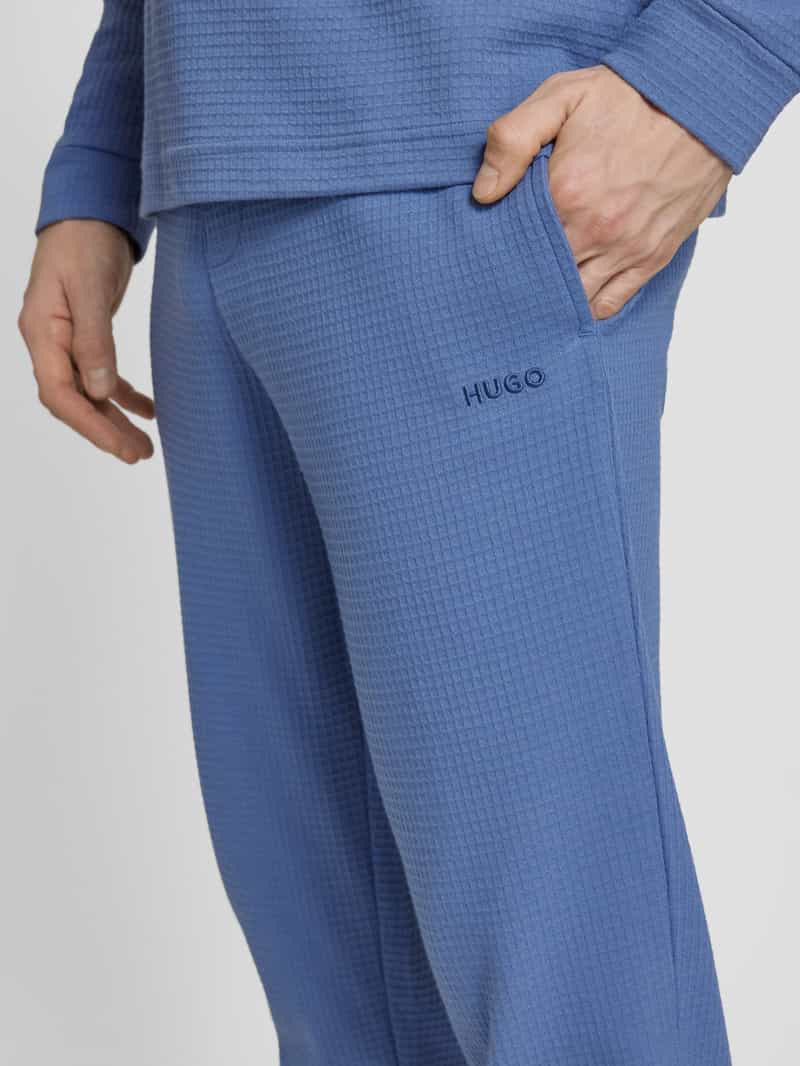 HUGO Relaxed fit sweatpants met structuurmotief model 'Austin'