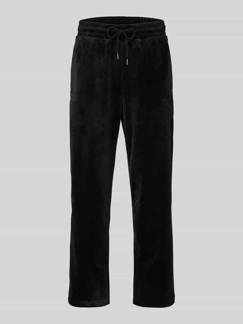 PUMA Performance relaxed fit sweatbroek met logodetail