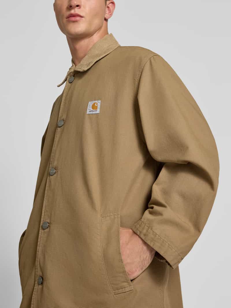 Carhartt Work In Progress Lange jas met labelpatch model 'Webster'