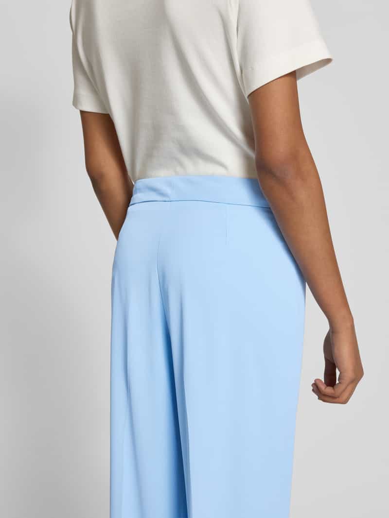 Review High waist stoffen broek met persplooien