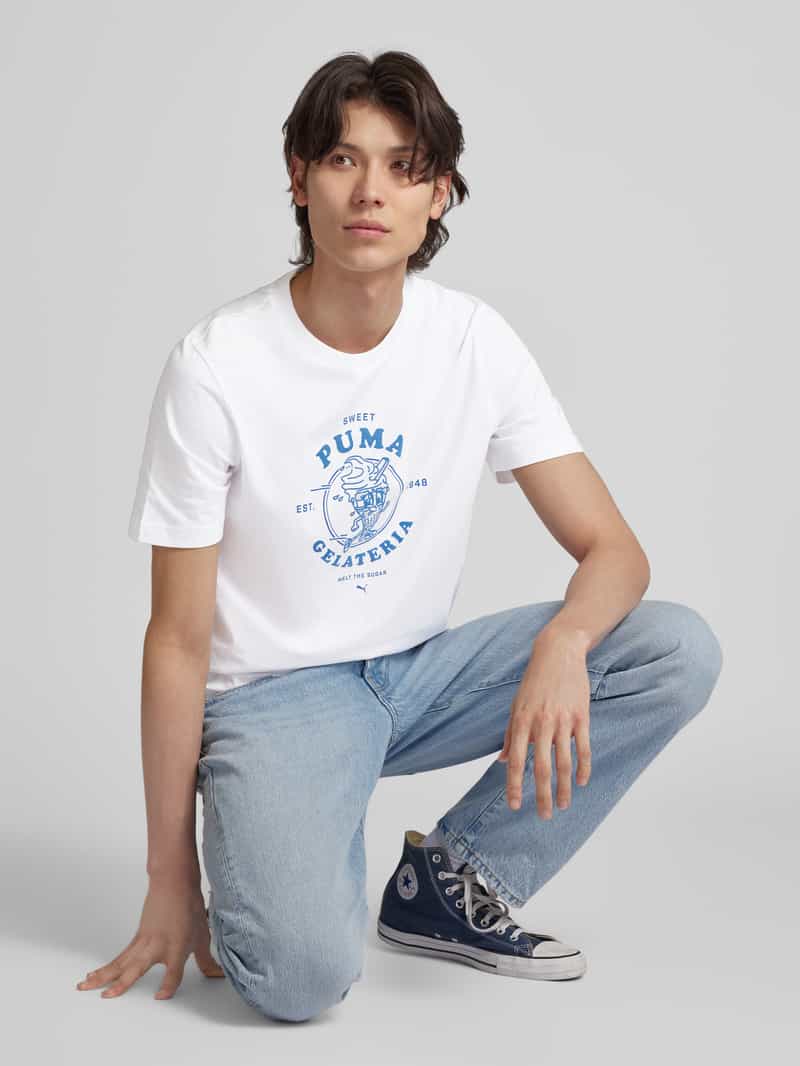 PUMA PERFORMANCE T-shirt met label- en motiefprint