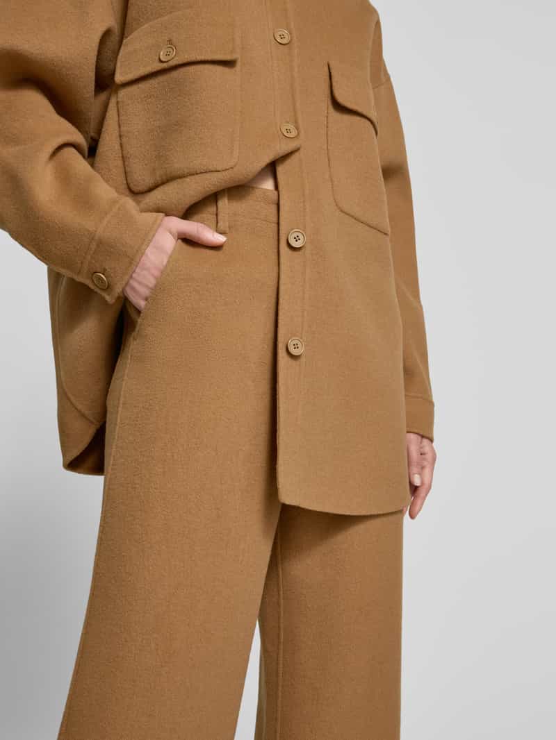 Style Icon Collection Uitlopende wide leg broek van wolmix curated by Maja Weyhe