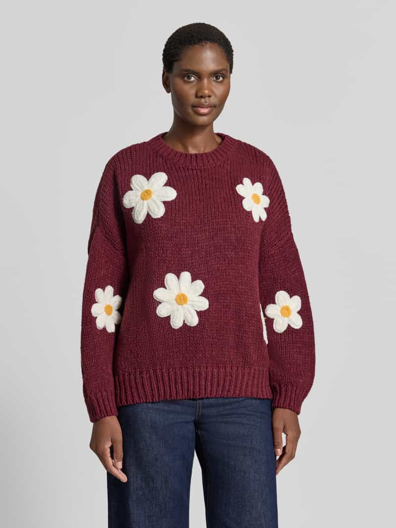 Apricot oversized gebreide pullover met florale stitchings