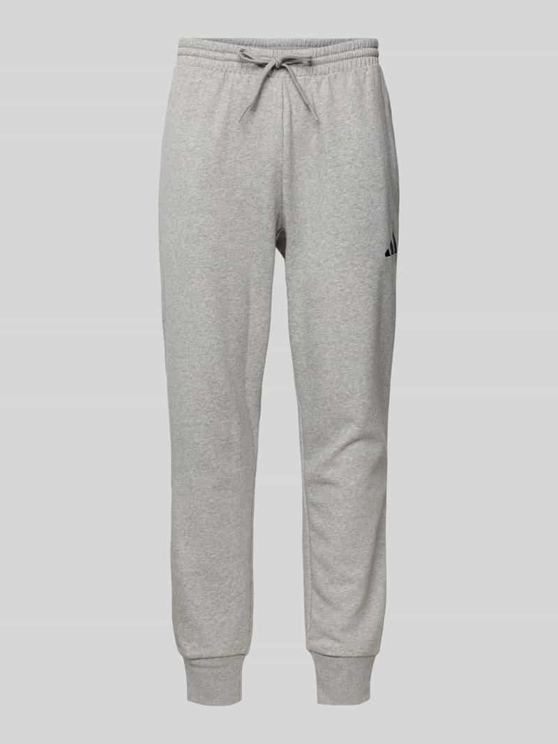 ADIDAS SPORTSWEAR Relaxed fit sweatpants met logostitching
