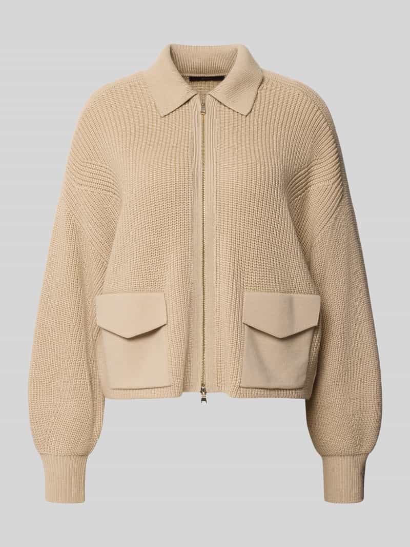 Windsor. Vest van scheerwol met klepzakken