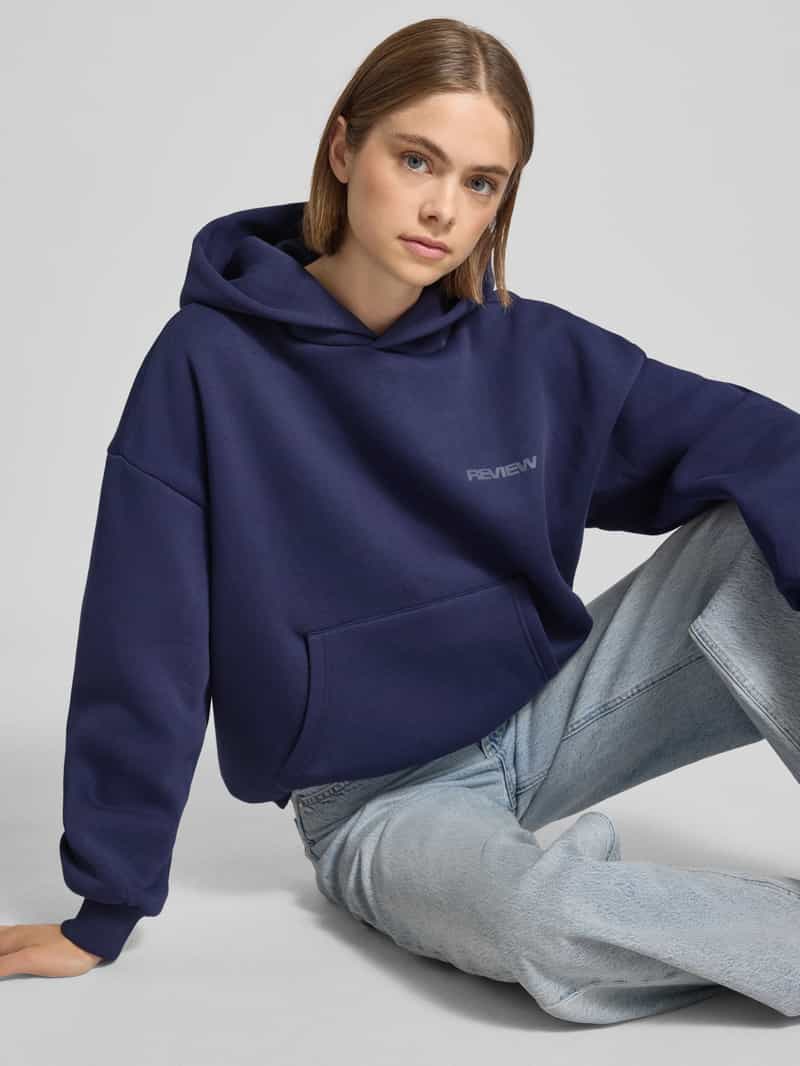 Review Hoodie met extra brede schouders en kangoeroezak
