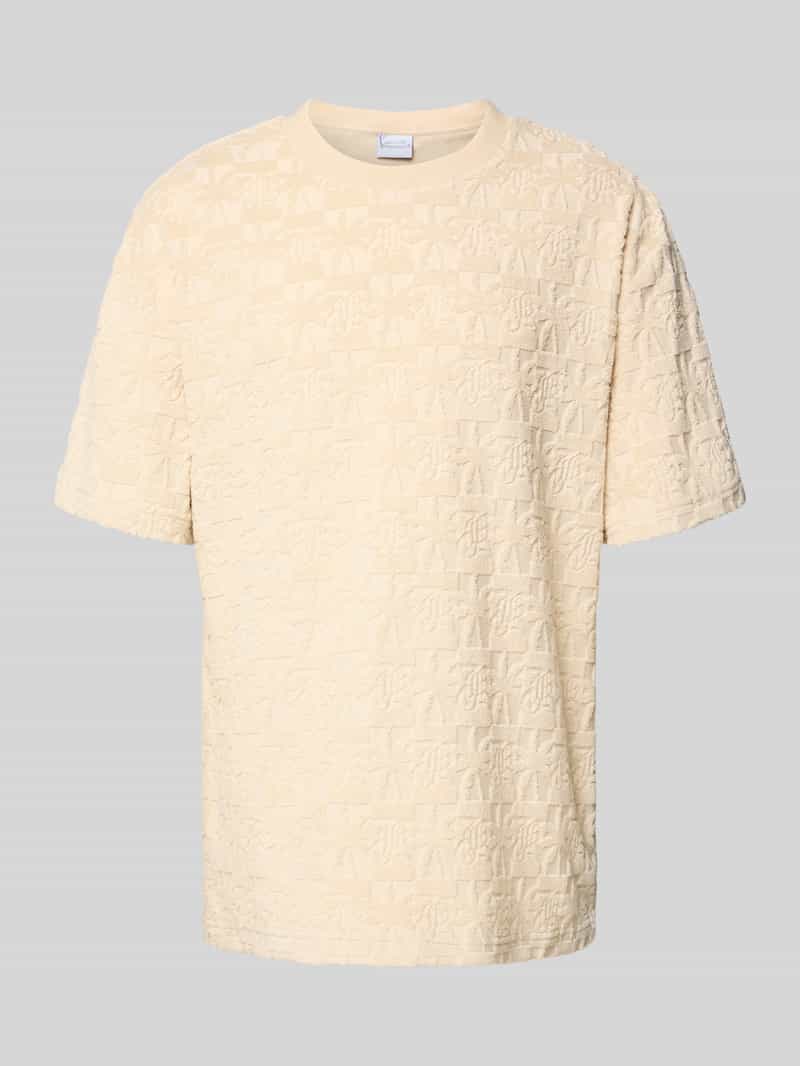 Karl Kani T-shirt in all-over look met ronde hals