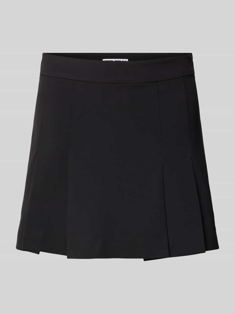 Review Minirok met plooien
