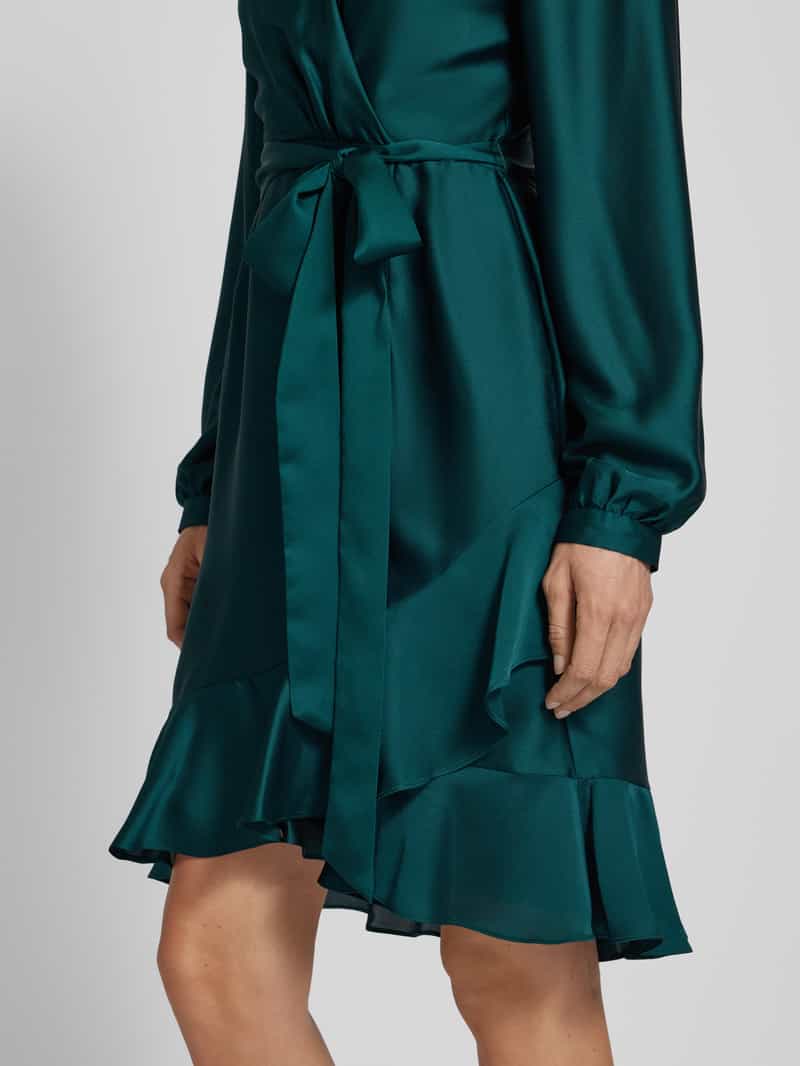 Swing Cocktailjurk in wikkellook