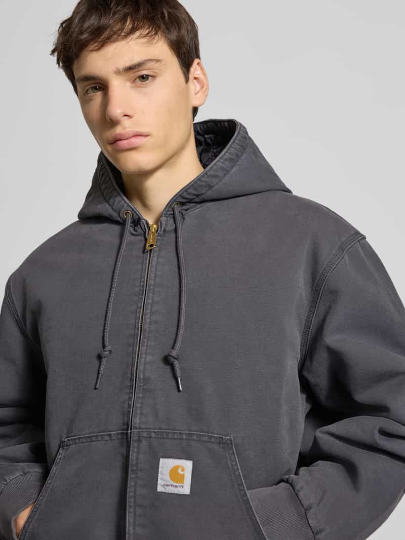 Carhartt Work In Progress Jack met kangoeroezak en labeldetail