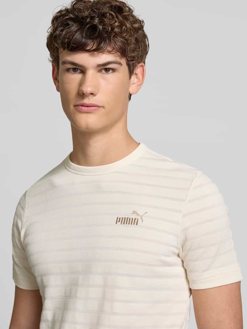 PUMA PERFORMANCE T-shirt met structuurmotief model 'ESS ELEVATED'