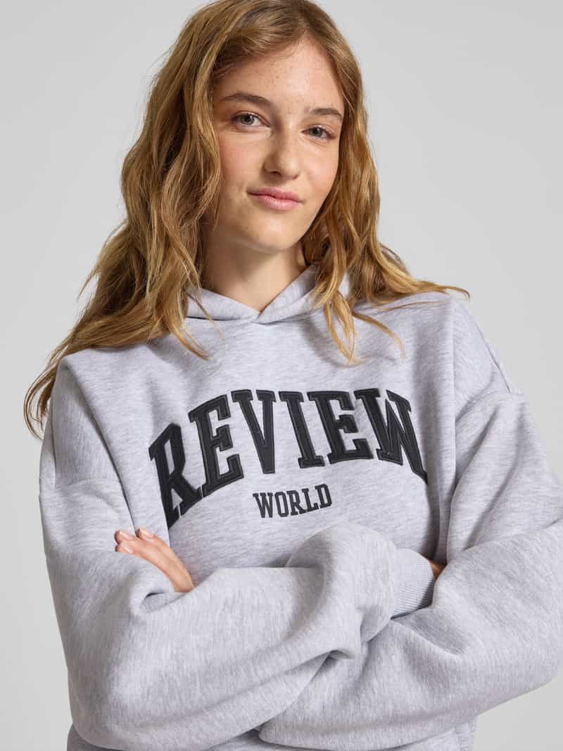 Review Oversized hoodie met labelprint