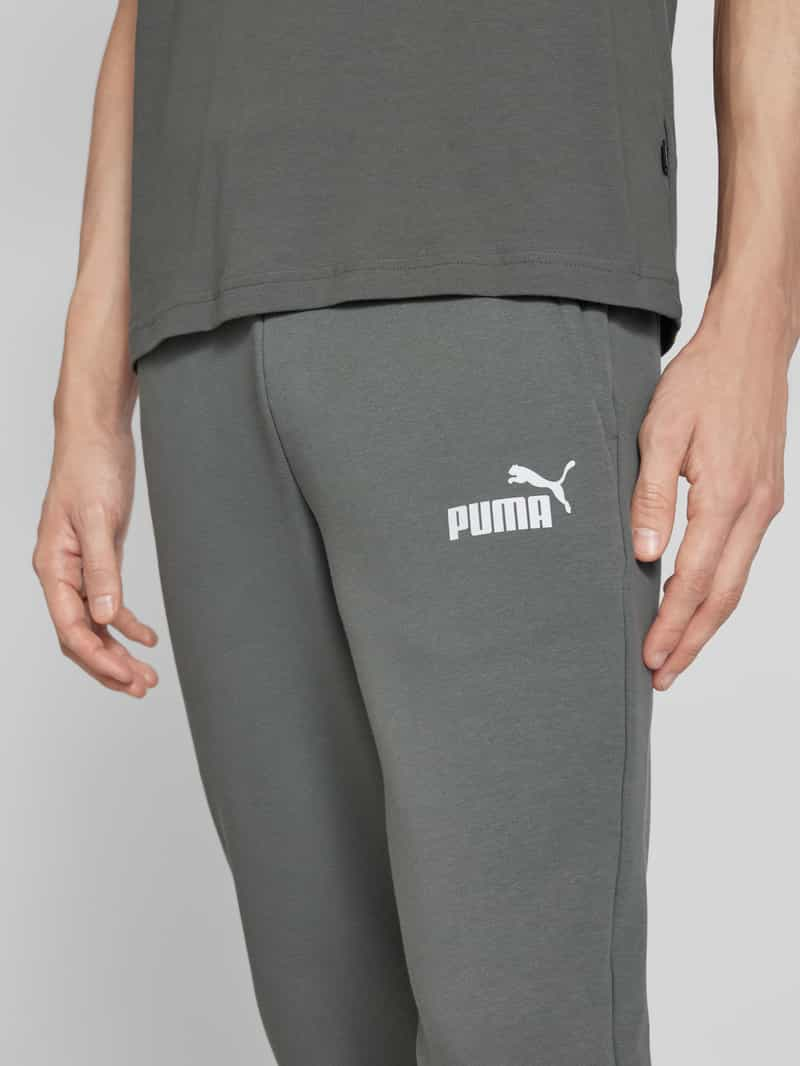 PUMA PERFORMANCE Regular fit sweatpants met labelprint