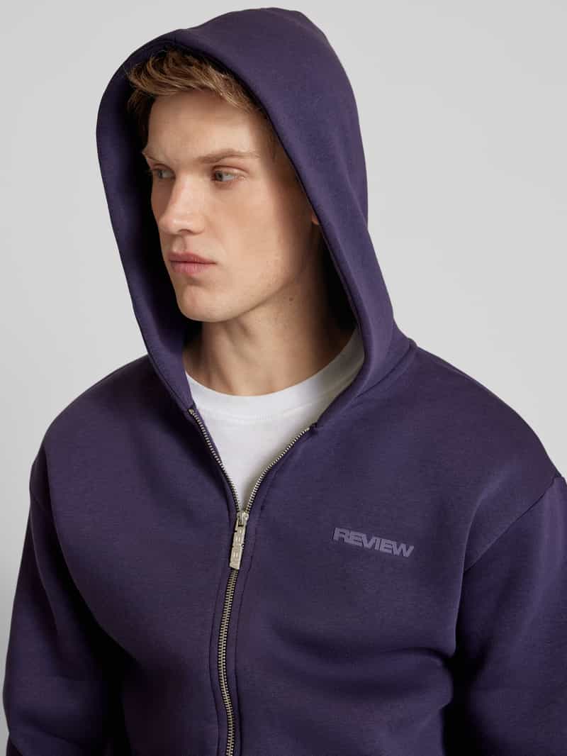 REVIEW Oversized sweatjack met labelprint