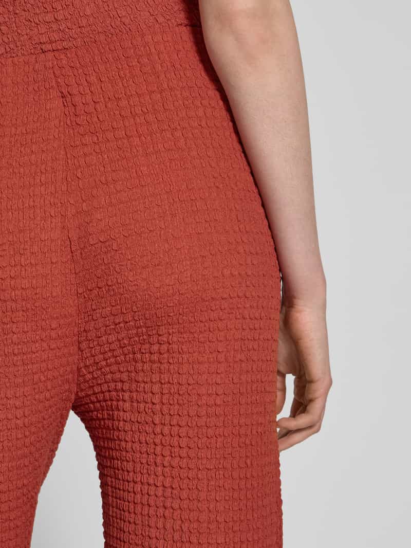 Christian Berg Woman Flared stoffen broek met structuurmotief
