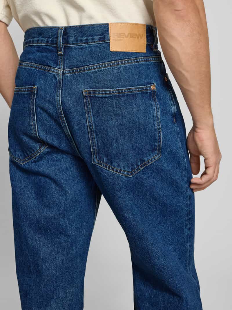 REVIEW Baggy fit jeans met labeldetails