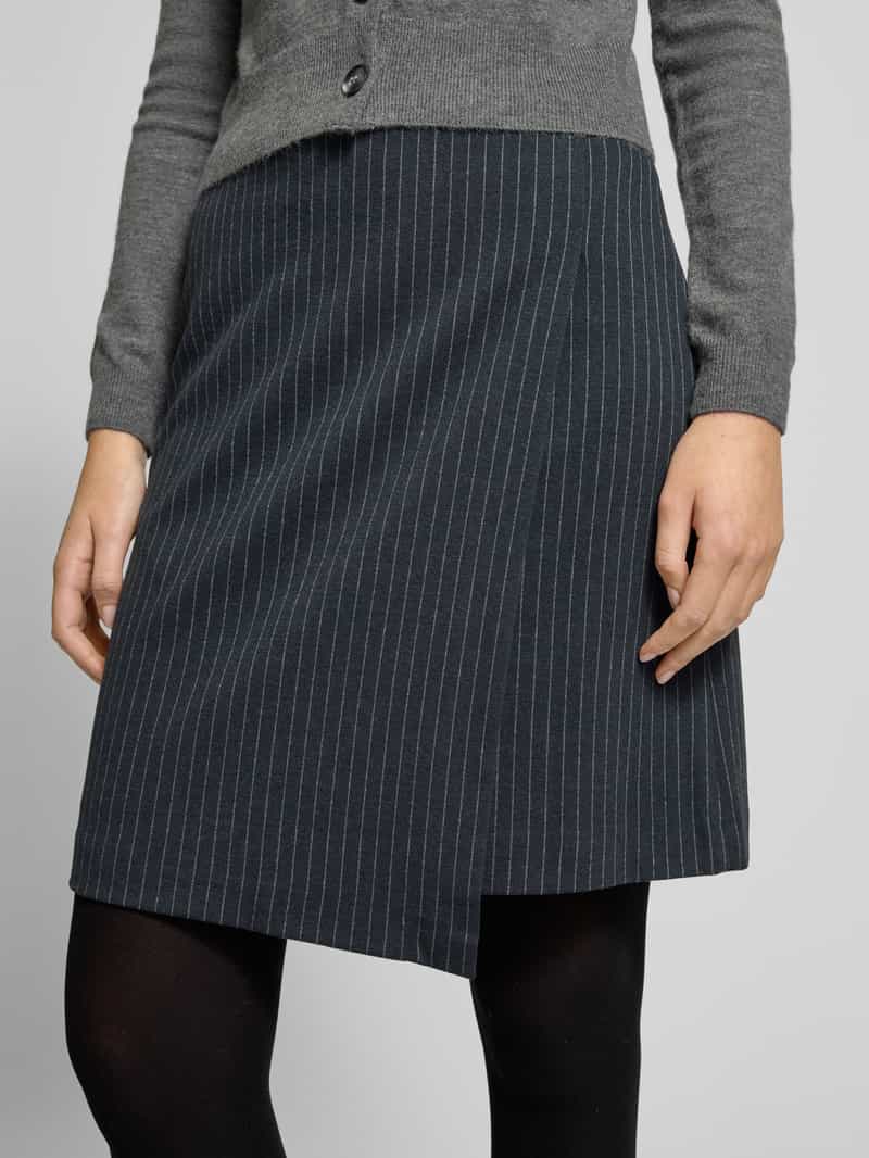Christian Berg Woman Minirok in wikkellook